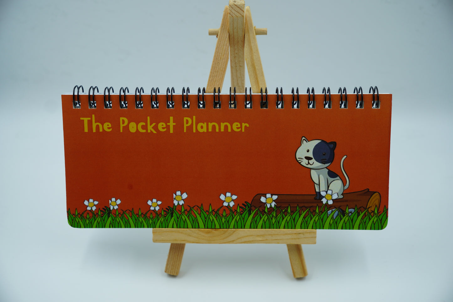 The Pocket Planner – Playful Grey Cat & Daisies (Orange)