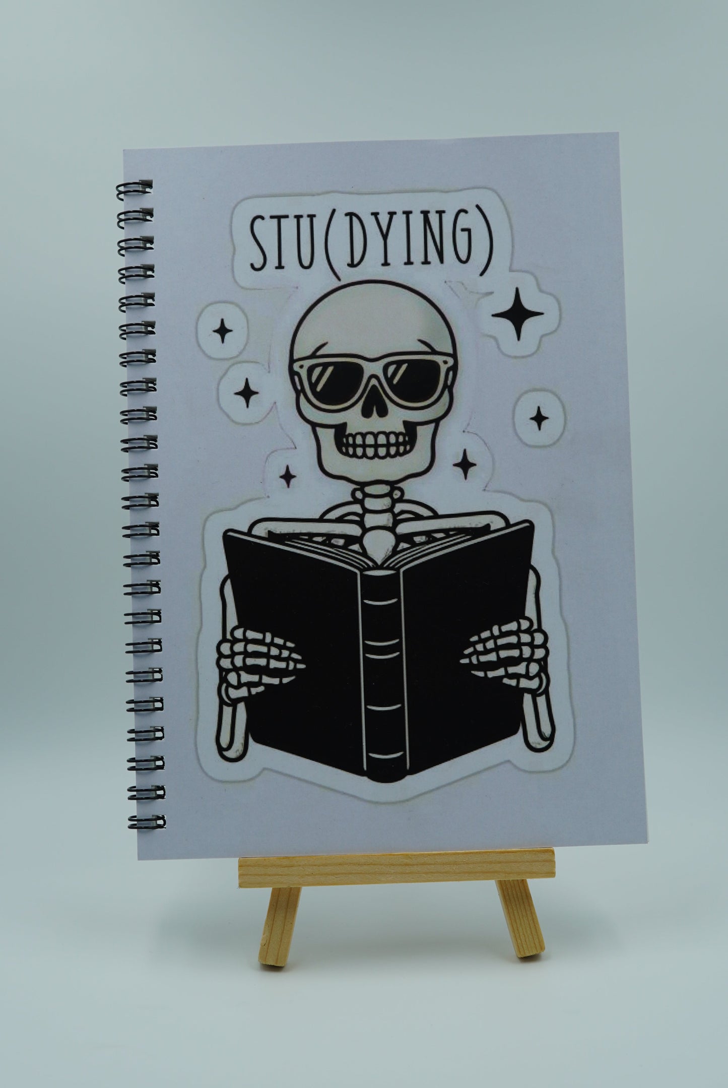 Notebook with a skeleton design on a white background