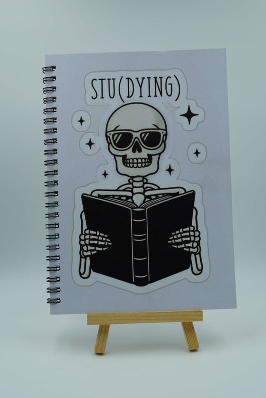 Notebook with a skeleton design on a white background